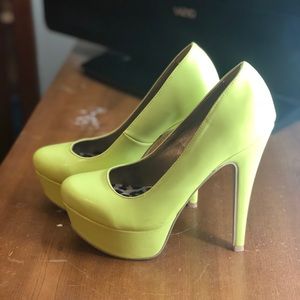 Neon yellow pumps